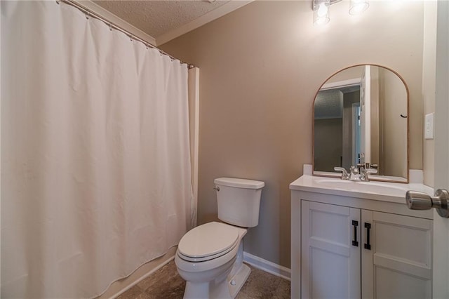 bathroom with vanity, a textured ceiling, and toilet