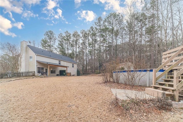 view of yard featuring a pool