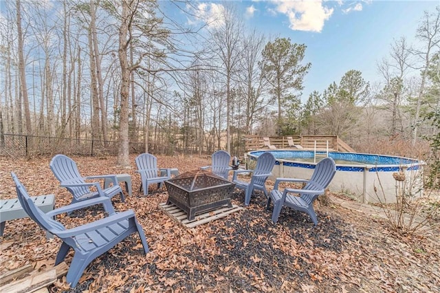 view of yard with an outdoor fire pit