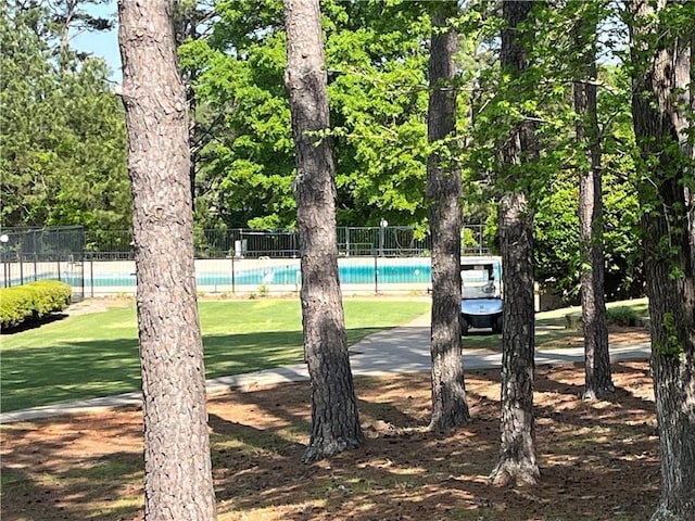 148 River N Blvd, Macon, GA 31211 - view of home's community with fence and a pool