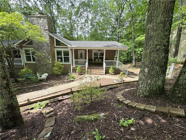 334 Eagle Cir, Dillard, GA 30537 - view of front facade with covered porch, a chimney, and a ceiling fan