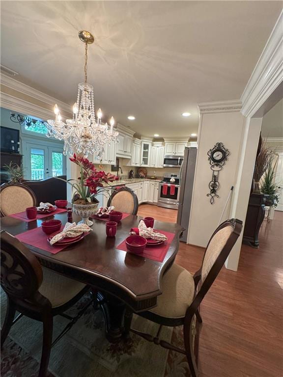 334 Eagle Cir, Dillard, GA 30537 - dining room featuring crown molding, light wood-style floors, a chandelier, and recessed lighting