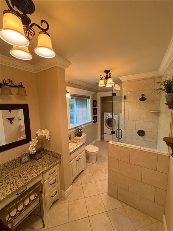 334 Eagle Cir, Dillard, GA 30537 - bathroom featuring crown molding, walk in shower, vanity, washer / clothes dryer, and tile patterned flooring
