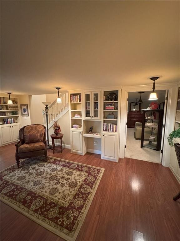 334 Eagle Cir, Dillard, GA 30537 - living area with wood finished floors, built in features, and stairway