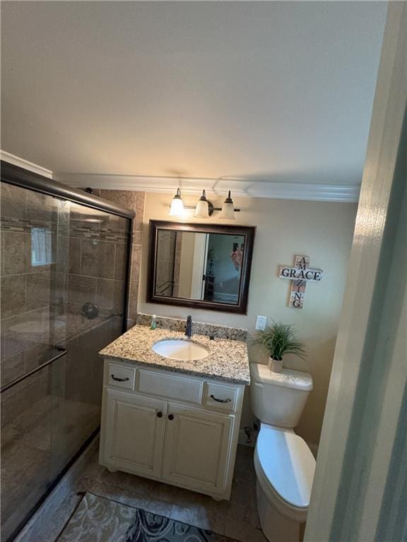334 Eagle Cir, Dillard, GA 30537 - bathroom featuring ornamental molding, toilet, vanity, and a stall shower