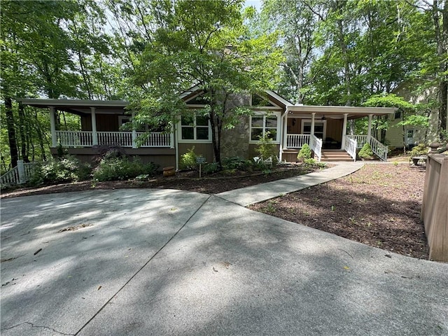 334 Eagle Cir, Dillard, GA 30537 - view of front of home featuring a porch and stone siding