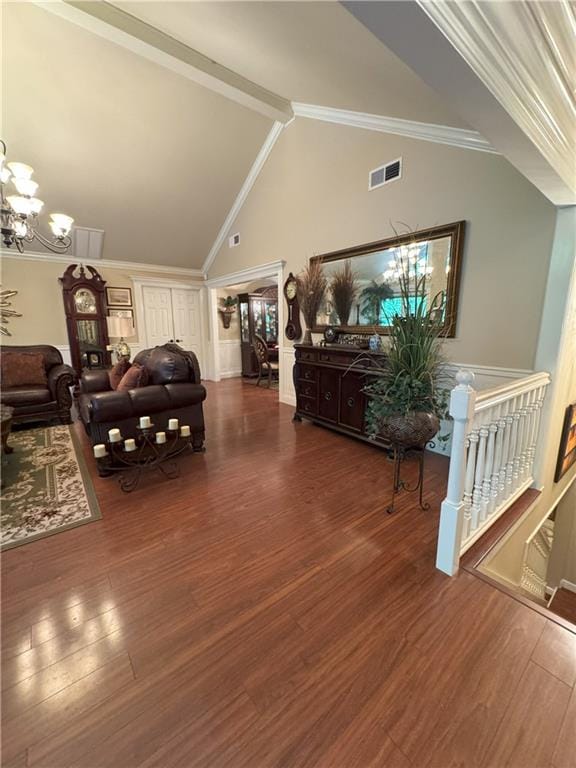 334 Eagle Cir, Dillard, GA 30537 - living room with wood finished floors, a chandelier, and ornamental molding