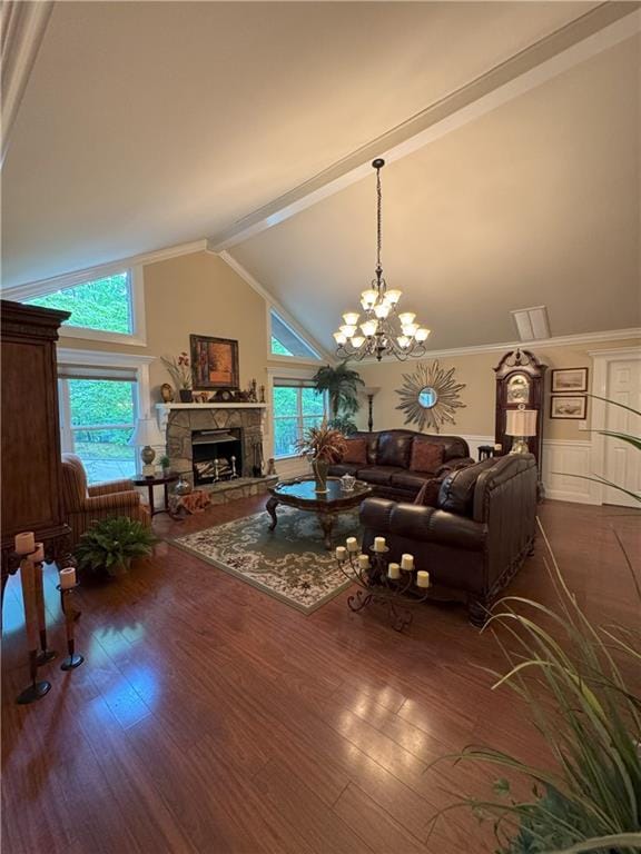 334 Eagle Cir, Dillard, GA 30537 - living room with high vaulted ceiling, a fireplace, dark wood-style flooring, and a chandelier