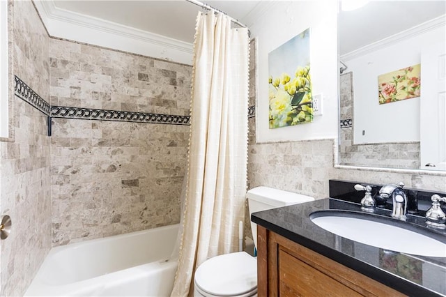 full bathroom with toilet, vanity, shower / bath combo with shower curtain, ornamental molding, and tile walls