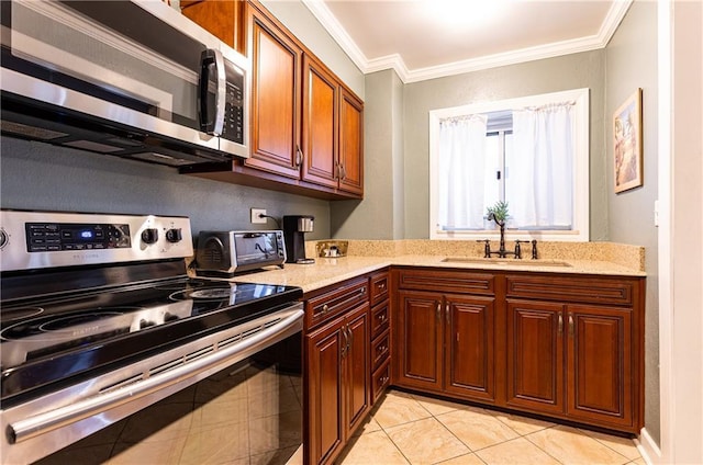 kitchen featuring crown molding, light tile patterned floors, stainless steel appliances, a sink, and light stone countertops