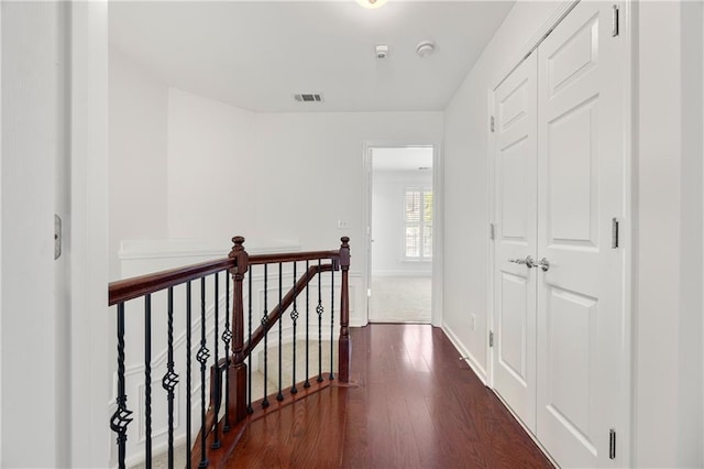 2513 Friar Tuck Ln SE Unit 1, Atlanta, GA 30339 - hall featuring an upstairs landing, dark wood-style floors, and baseboards