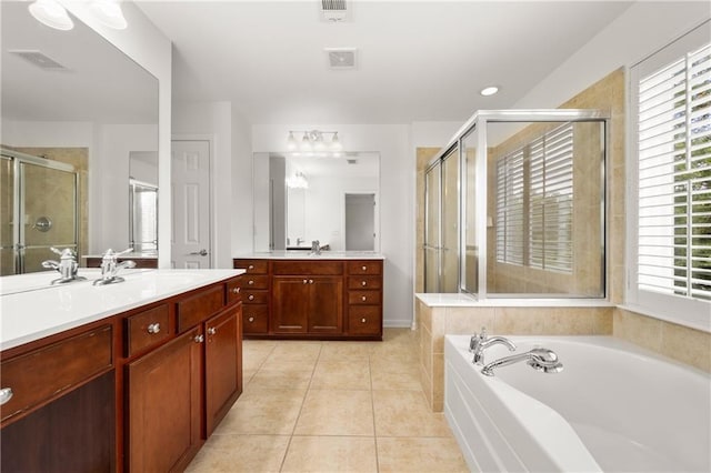 2513 Friar Tuck Ln SE Unit 1, Atlanta, GA 30339 - bathroom featuring a shower stall, tile patterned flooring, a bath, and two vanities