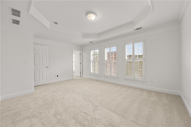2513 Friar Tuck Ln SE Unit 1, Atlanta, GA 30339 - carpeted empty room featuring a raised ceiling, crown molding, and baseboards