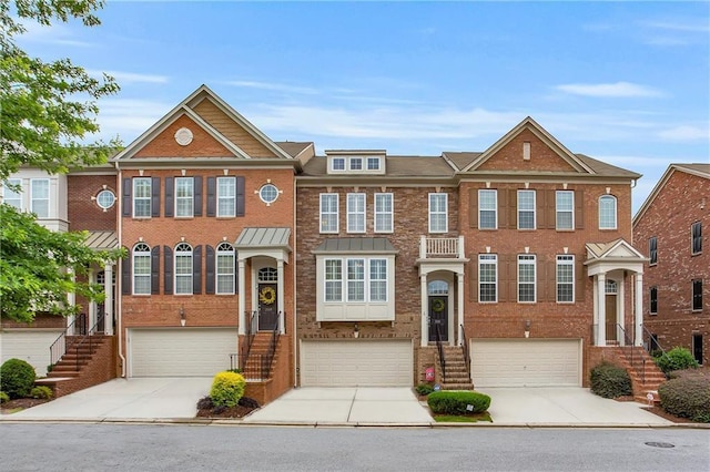 2513 Friar Tuck Ln SE Unit 1, Atlanta, GA 30339 - view of front of home featuring an attached garage, driveway, and brick siding