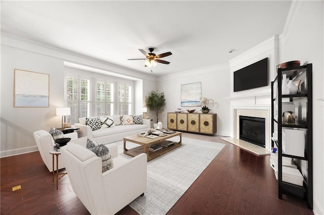 2513 Friar Tuck Ln SE Unit 1, Atlanta, GA 30339 - living room featuring ornamental molding, ceiling fan, dark wood-style flooring, a premium fireplace, and baseboards