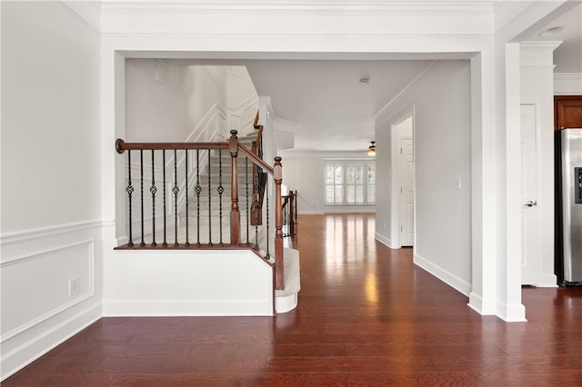 2513 Friar Tuck Ln SE Unit 1, Atlanta, GA 30339 - stairway with wood finished floors, ornamental molding, ceiling fan, and baseboards