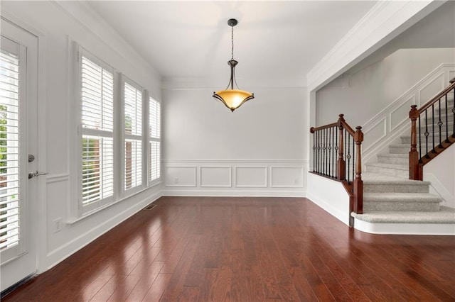2513 Friar Tuck Ln SE Unit 1, Atlanta, GA 30339 - unfurnished dining area featuring hardwood / wood-style floors, stairway, and ornamental molding