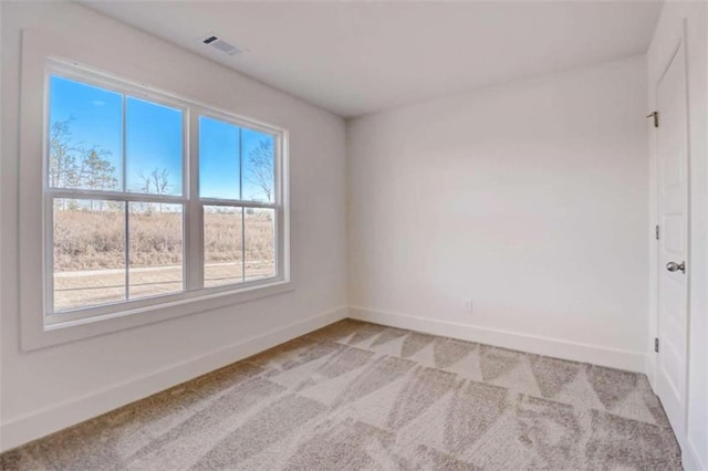 view of carpeted spare room