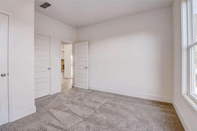 unfurnished bedroom featuring carpet