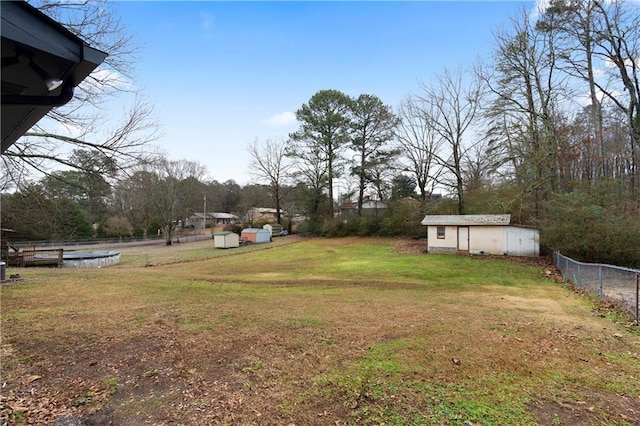 view of yard featuring a storage shed