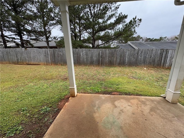 view of yard featuring a patio area and fence