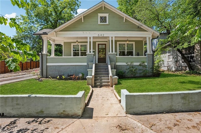 642 Erin Ave SW, Atlanta, GA 30310 - view of front of property featuring a front lawn and covered porch