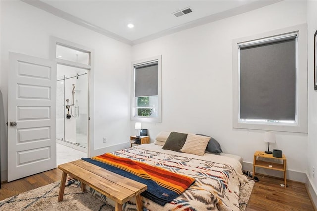 642 Erin Ave SW, Atlanta, GA 30310 - bedroom with wood finished floors, baseboards, recessed lighting, and ensuite bathroom