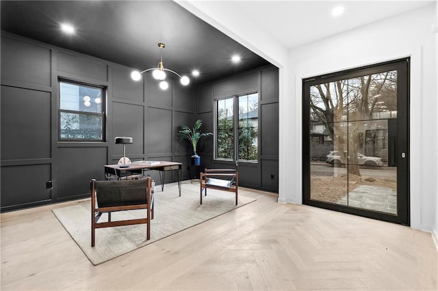 interior space with a decorative wall and recessed lighting