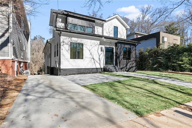 view of front of home featuring a front yard and entry steps