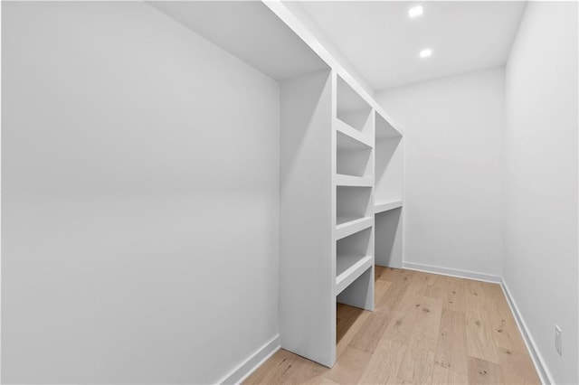 walk in closet featuring light wood-style floors