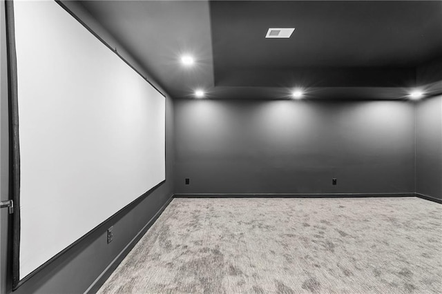 unfurnished room with recessed lighting, baseboards, and carpet