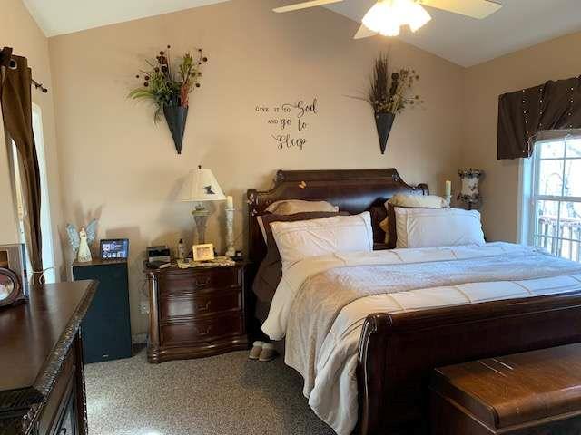 789 N Falling Waters Dr N, Demorest, GA 30535 - bedroom with vaulted ceiling and ceiling fan