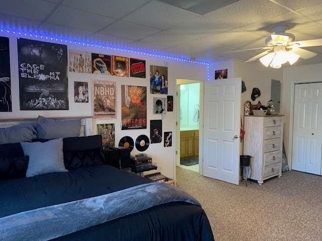 789 N Falling Waters Dr N, Demorest, GA 30535 - carpeted bedroom with a drop ceiling, a closet, and ceiling fan