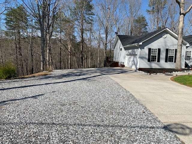 789 N Falling Waters Dr N, Demorest, GA 30535 - view of property exterior featuring concrete driveway and a garage
