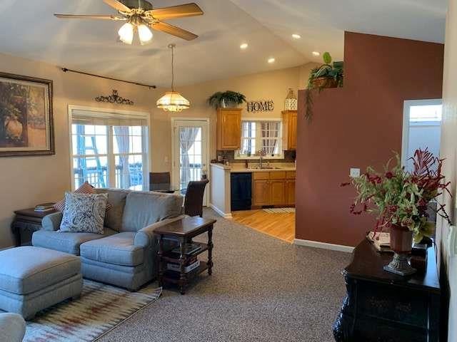 789 N Falling Waters Dr N, Demorest, GA 30535 - living area with light carpet, plenty of natural light, a ceiling fan, lofted ceiling, and recessed lighting