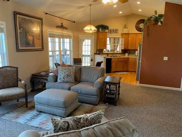 789 N Falling Waters Dr N, Demorest, GA 30535 - living area featuring ceiling fan, recessed lighting, baseboards, light colored carpet, and vaulted ceiling