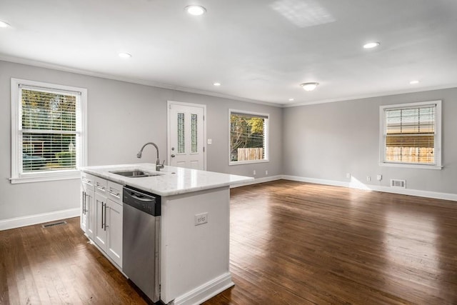 kitchen with ornamental molding, a sink, and stainless steel dishwasher