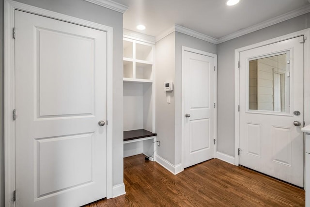 mudroom with ornamental molding, recessed lighting, dark wood finished floors, and baseboards