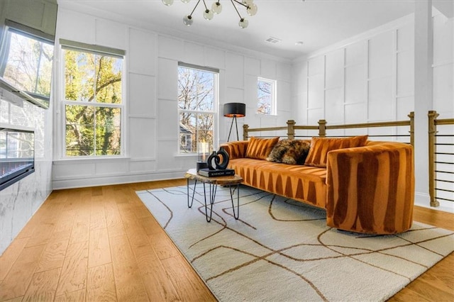 sunroom with a notable chandelier