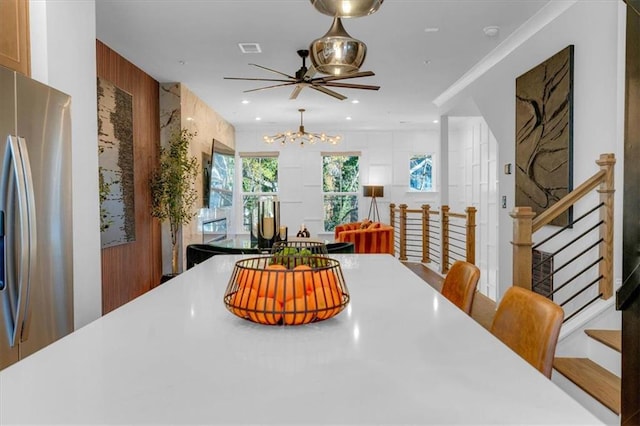 dining space with a notable chandelier