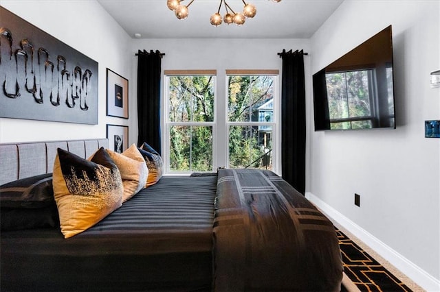 bedroom with an inviting chandelier