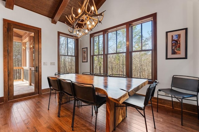 975 Blalock Lakes Dr, Newnan, GA 30263 - dining room with vaulted ceiling with beams, hardwood / wood-style floors, wooden ceiling, and an inviting chandelier