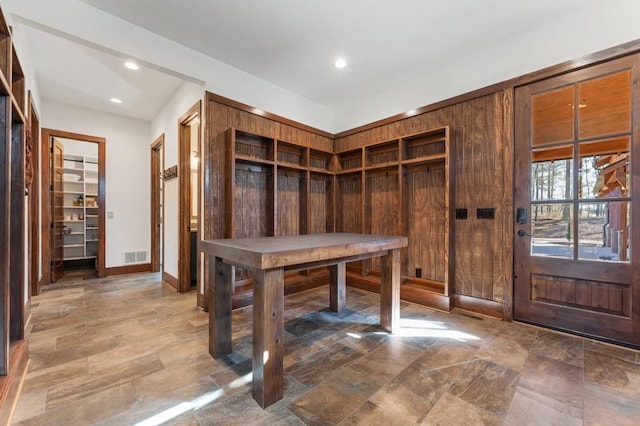 975 Blalock Lakes Dr, Newnan, GA 30263 - mudroom with stone finish floor, baseboards, visible vents, and recessed lighting