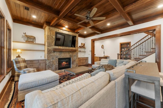 975 Blalock Lakes Dr, Newnan, GA 30263 - living room with beamed ceiling, a fireplace, wood finished floors, and wood ceiling