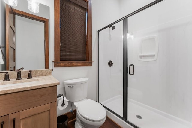 975 Blalock Lakes Dr, Newnan, GA 30263 - bathroom with toilet, a shower stall, and vanity