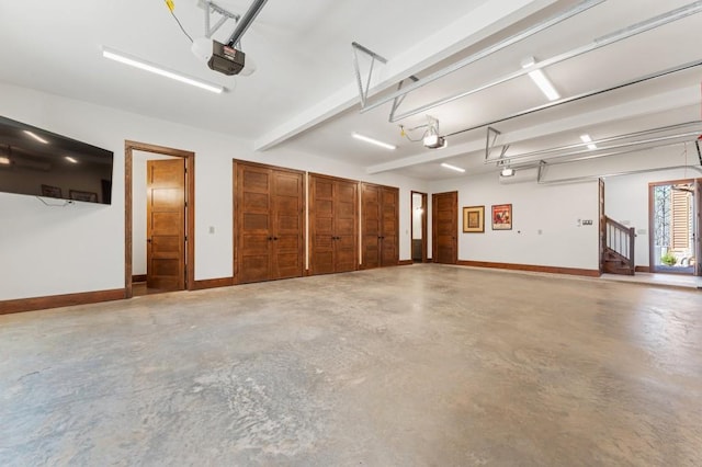 975 Blalock Lakes Dr, Newnan, GA 30263 - garage with baseboards and a garage door opener