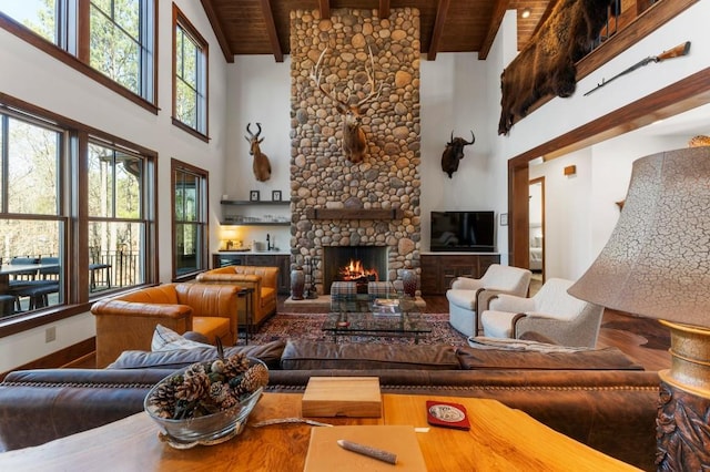 975 Blalock Lakes Dr, Newnan, GA 30263 - living area with a wealth of natural light, wood ceiling, and a fireplace