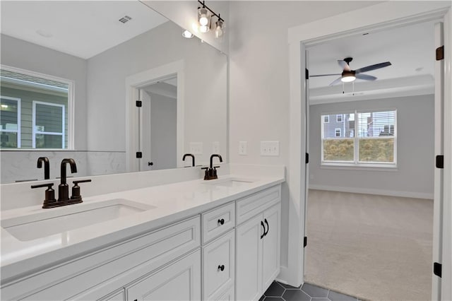 bathroom featuring vanity and ceiling fan