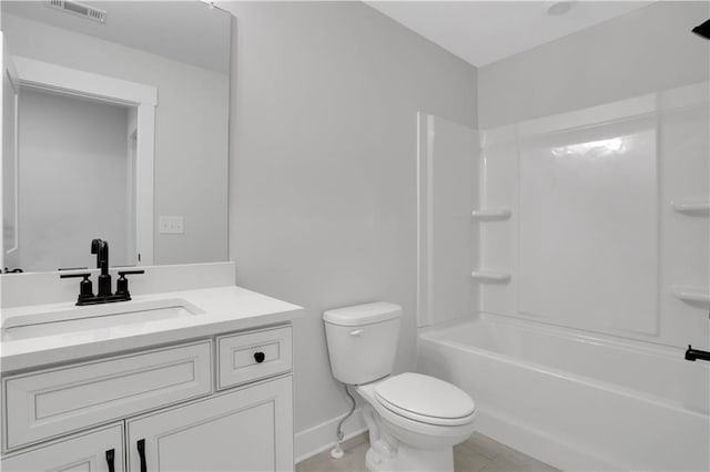 full bathroom with vanity, tile patterned floors, bathing tub / shower combination, and toilet