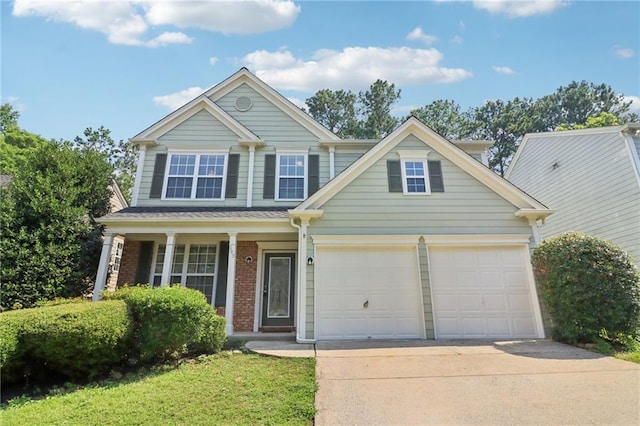605 Alstonefield Dr, Alpharetta, GA 30004 - traditional-style house with driveway, brick siding, and a garage